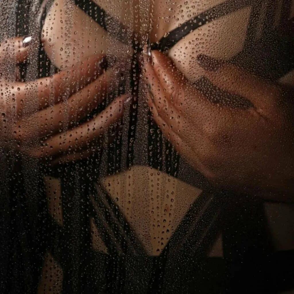 Close-up boudoir portrait highlighting lace lingerie detail